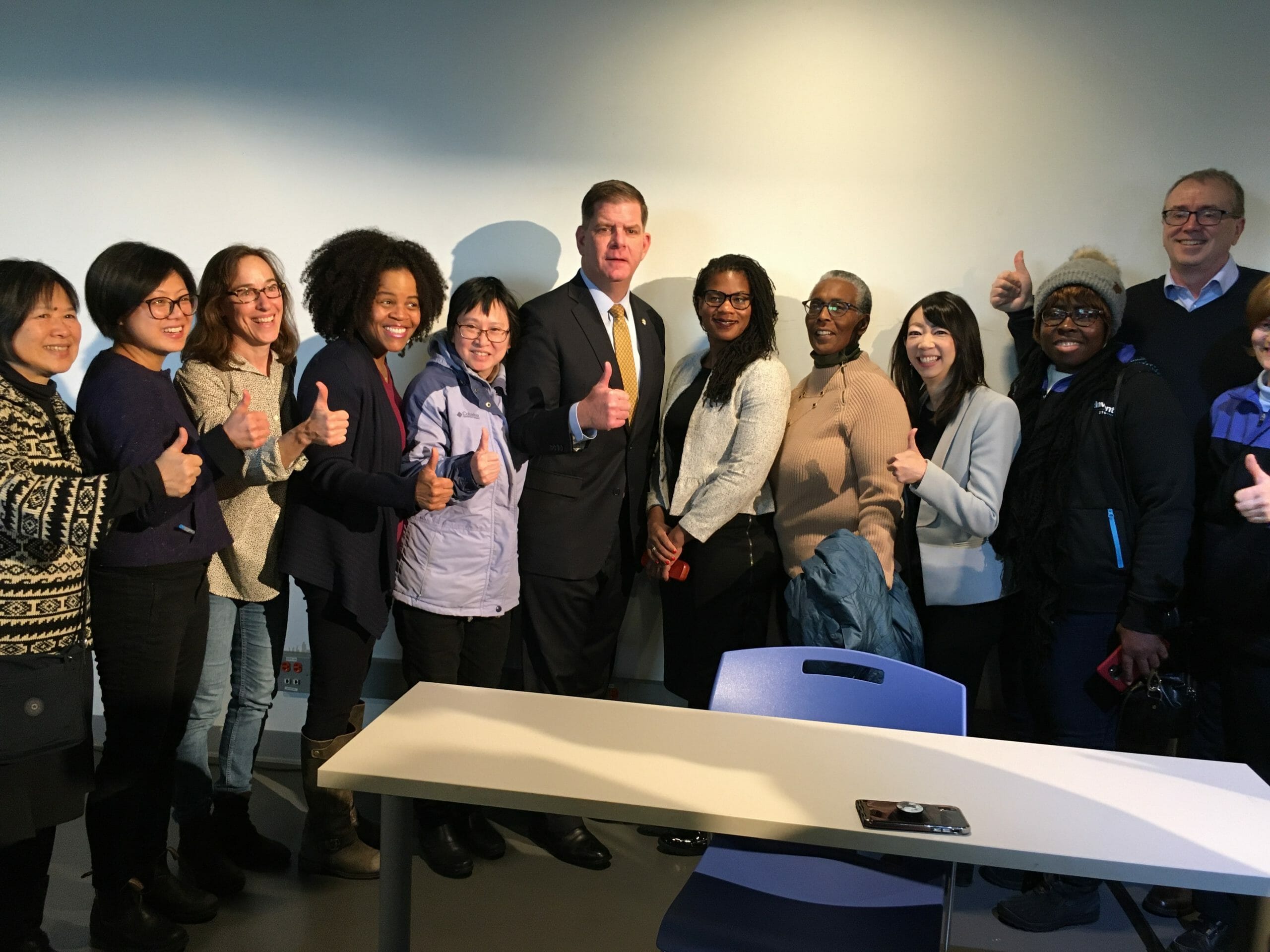Mayor Walsh with housing advocates and lead sponsors.