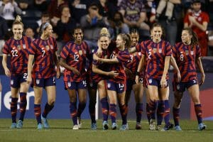 CHESTER, PENNSYLVANIA - APRIL 12: The United States celebrate a goal by Trinity Rodman #14 (C-L) during the second half against Uzbekistan at Subaru Park on April 12, 2022 in Chester, Pennsylvania. (Photo by Tim Nwachukwu/Getty Images)