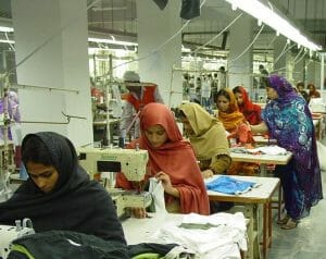 Women working at sewing machines.