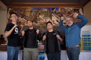 Ramirez, right, with Together for Brothers organizers.