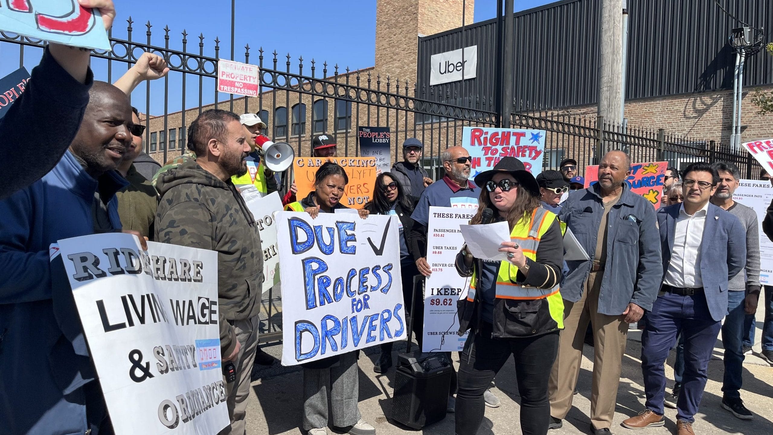 Drivers with the Chicago Gig Alliance rally outside Uber’s Chicago hub, courtesy of PowerSwitch Action