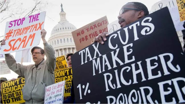 Protesters against Trump's tax bill